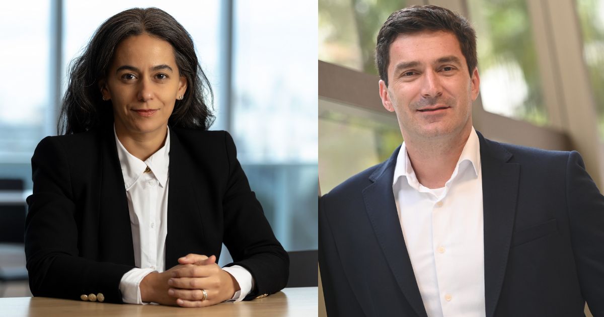 Retratos de Fernanda Baré, da Goodyear, e Maurício Paguaga, da ZF. Fernanda Baré aparece à esquerda, vestindo um blazer preto e camisa branca, com cabelos soltos e expressão séria, sentada a uma mesa com as mãos unidas. Maurício Paguaga está à direita, vestindo um blazer azul escuro e camisa branca, com um leve sorriso e postura relaxada em um ambiente com vidraças e vegetação ao fundo.